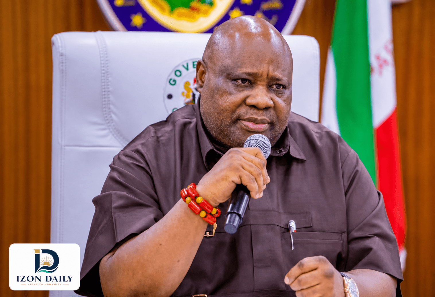 Osun State Governor Ademola Adeleke speaking into a microphone during an official engagement.
